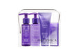 A travel kit containing four OBLIPHICA Seaberry hair care products for medium to coarse textures, including shampoo, conditioner, hair mask, and hair serum in TSA-approved bottles.