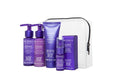 A travel kit containing four OBLIPHICA Seaberry hair care products for medium to coarse textures, including shampoo, conditioner, hair mask, and hair serum in TSA-approved bottles.