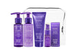 A travel kit containing four OBLIPHICA Seaberry hair care products for medium to coarse textures, including shampoo, conditioner, hair mask, and hair serum in TSA-approved bottles.