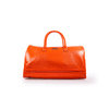 Orange crocodile-patterned handbag on a white background